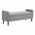Panca contenitore in tessuto grigio con gambe in legno